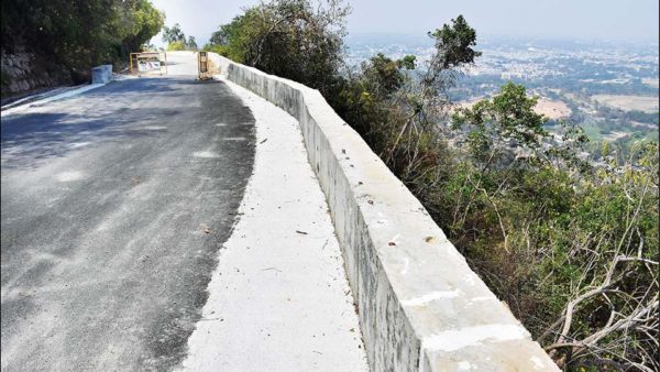 The strong barrier to Chamundi hill road which had fallen in heavy rains