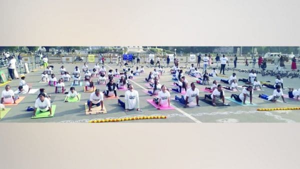Awareness against human trafficking through collective yoga